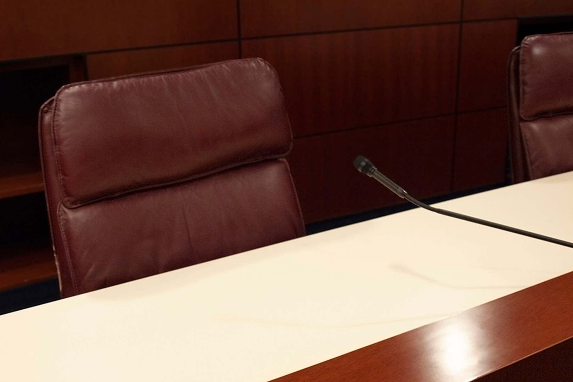 An empty chair in a Nevada public committee room